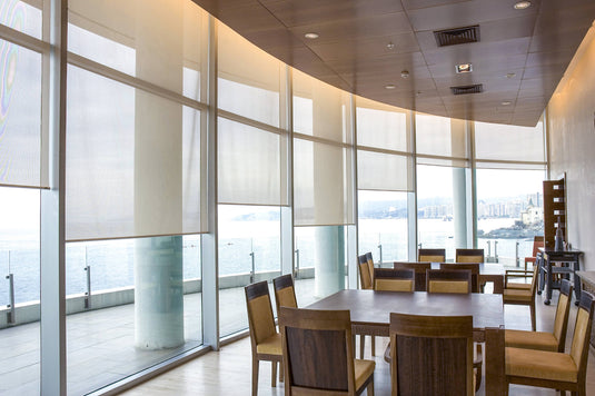 Enhance Your Restaurant's Ambiance with Solar Screen Shades for Glare Management